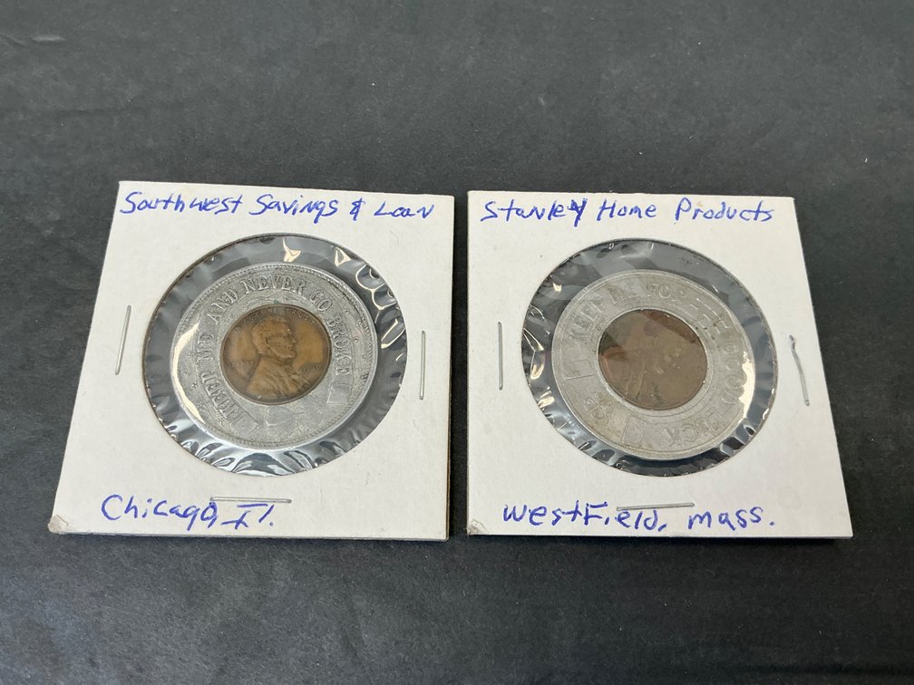 2 encased lucky penny advertising tokens