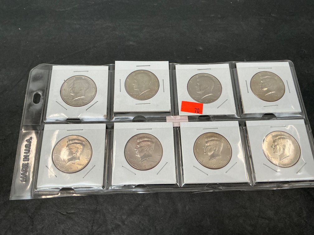 8 US Kennedy half dollar coins in 2x2 flips