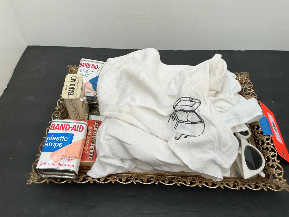 Vanity tray set, first aid tins, sunglasses & linens