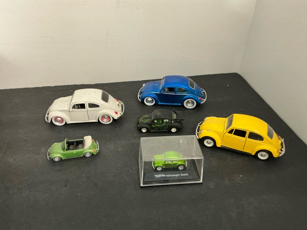 Volkswagen Beetle diecast model cars with display case