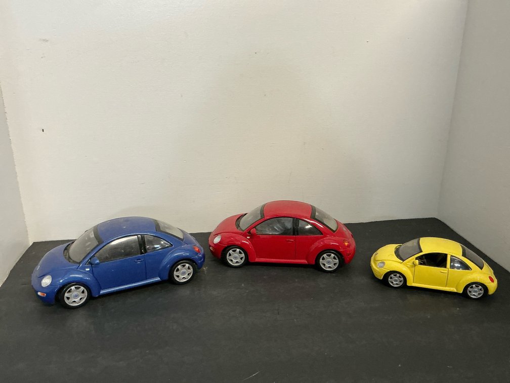 Grouping of Volkswagen New Beetle model cars