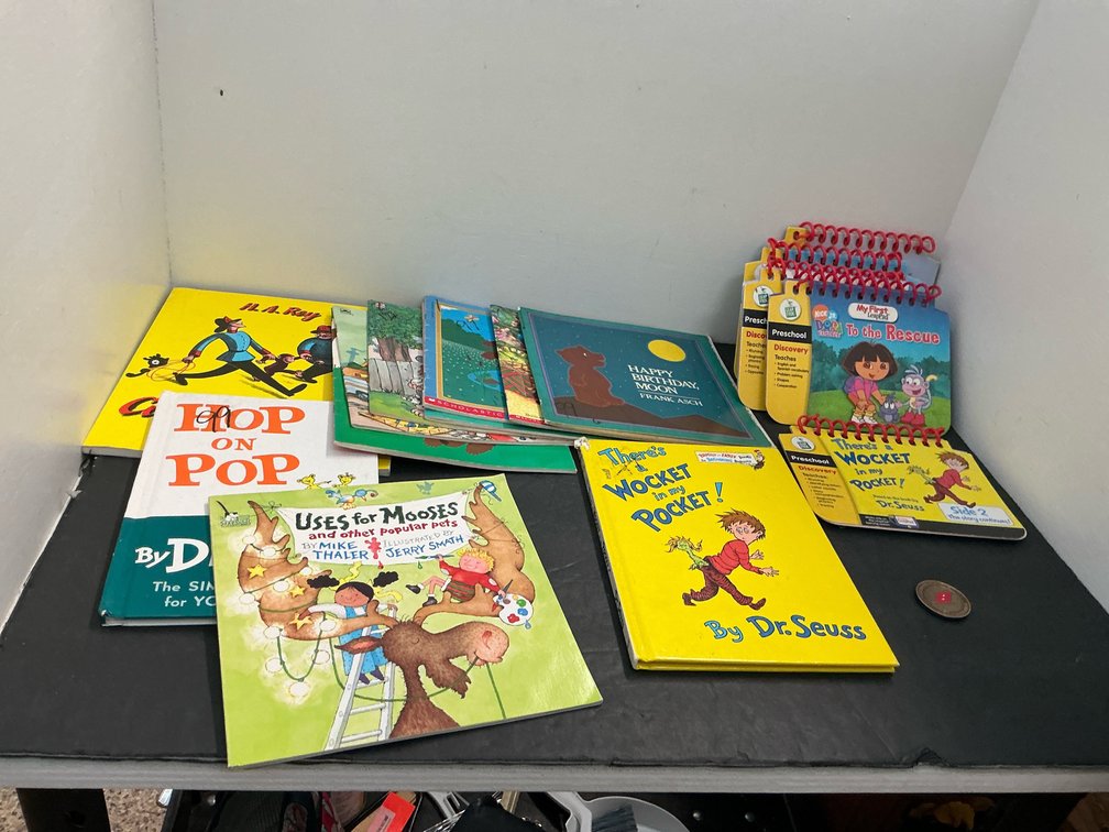 Children's books, activity books & challenge coin