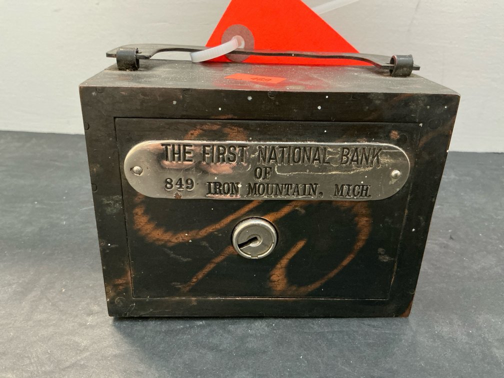 First National Bank of Iron Mountain lockbox with key