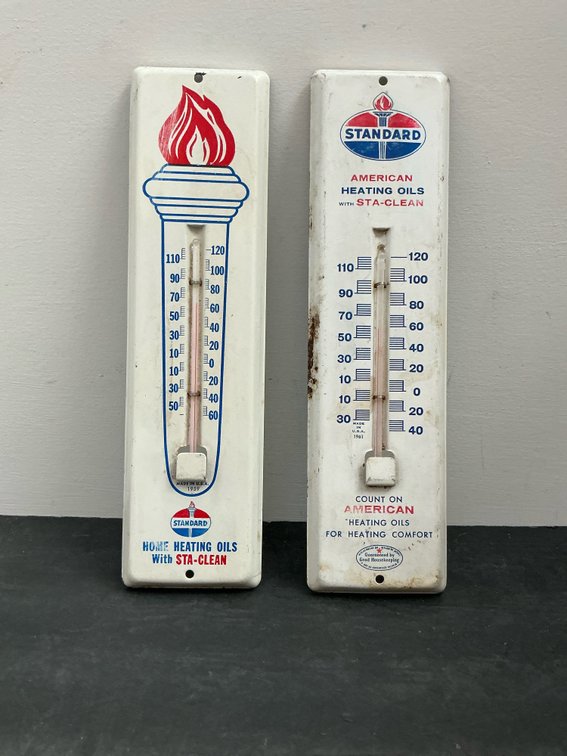 Pair of Standard metal advertising thermometers