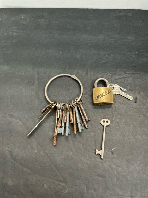 Slaymaker brass padlock with key & skeleton keys