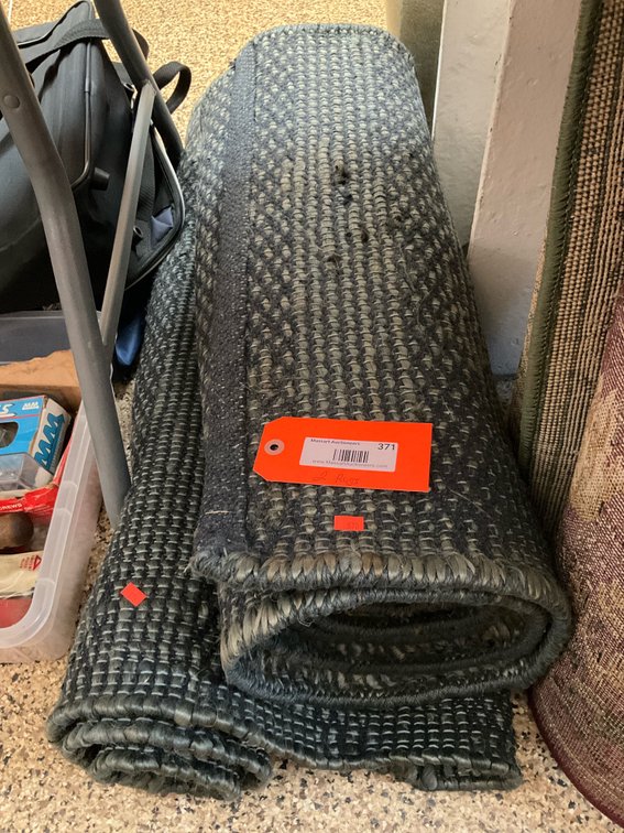 Pair of dark gray woven loop area rugs
