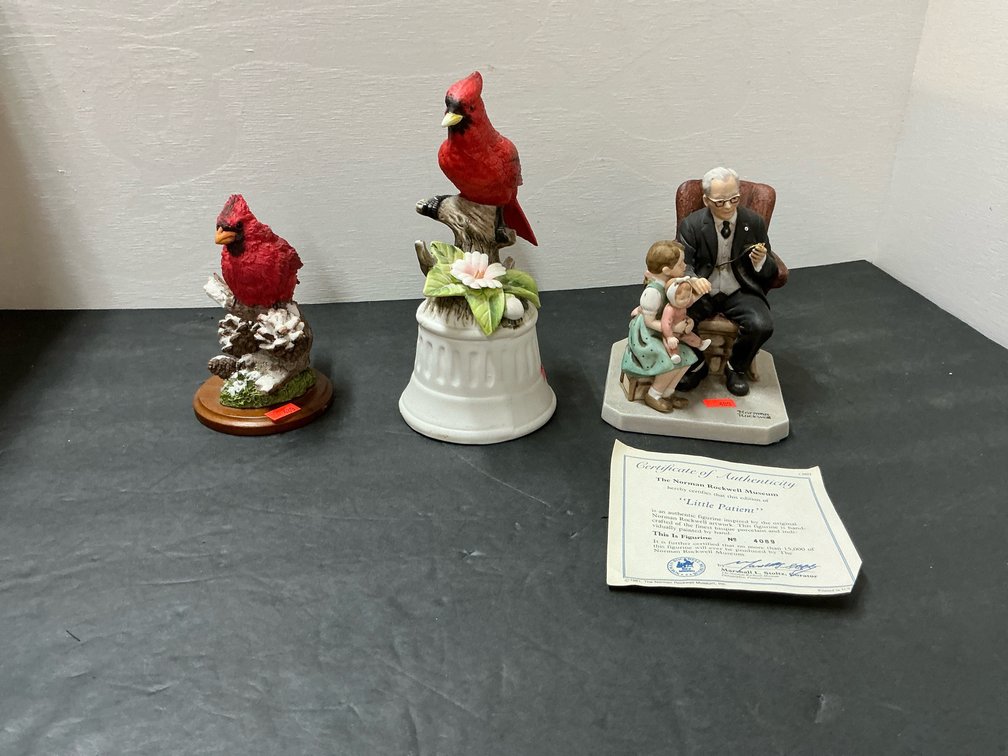 Grouping of figurines with Norman Rockwell & cardinals