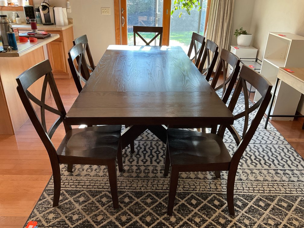Dark wood trestle dining table & 8 X-back chairs - Kitchen