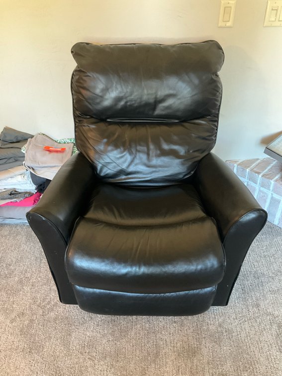 La-Z-Boy black swivel rocker recliner armchair with circular wood base - Living Room