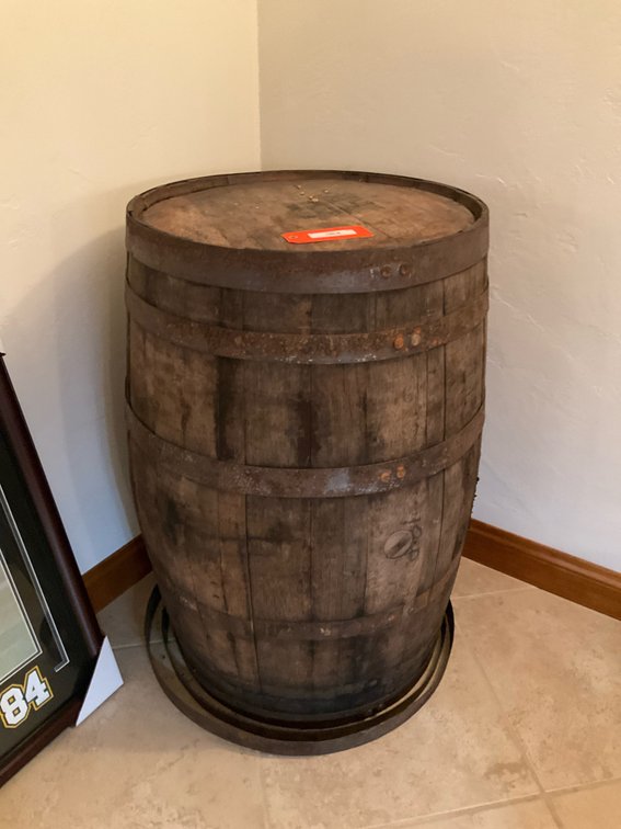 Wild Turkey wooden whiskey barrel with metal hoops - Basement Living & Bar Area