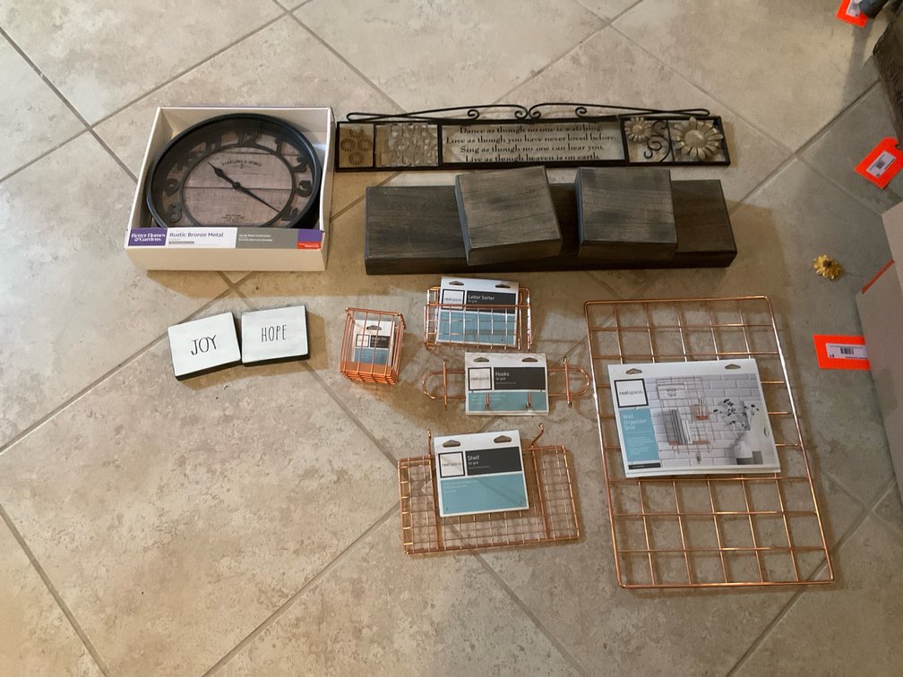 Wall clock, floating shelves & wire organizer grouping - Basement Living & Bar Area