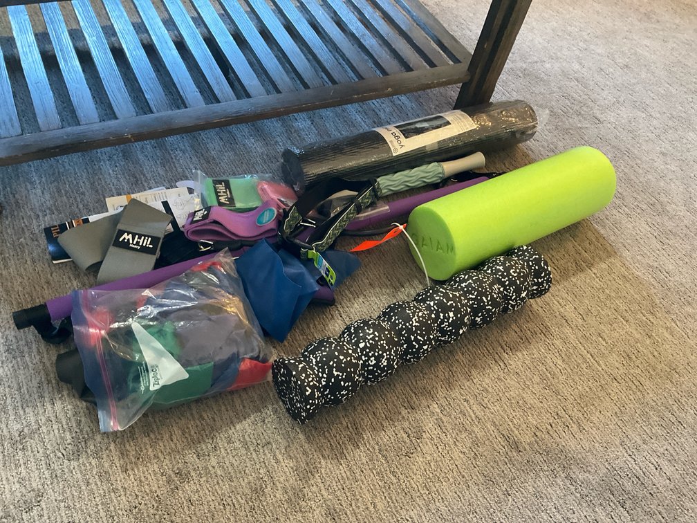Fitness equipment grouping with yoga mat & foam rollers - Living Room