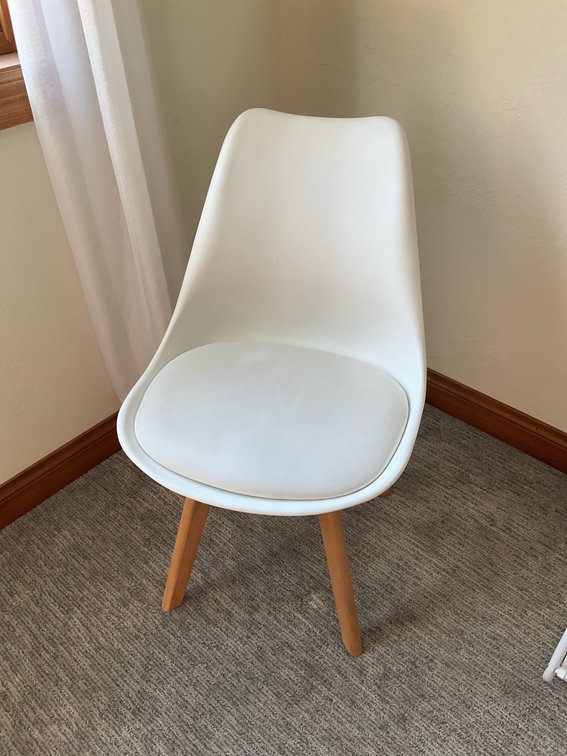 White molded plastic side chair with wood legs - Bedroom