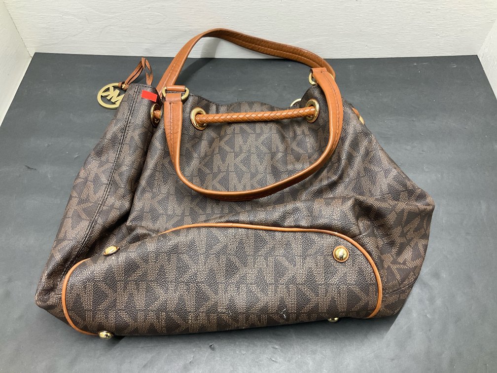 Michael Kors monogram shoulder tote with tassels