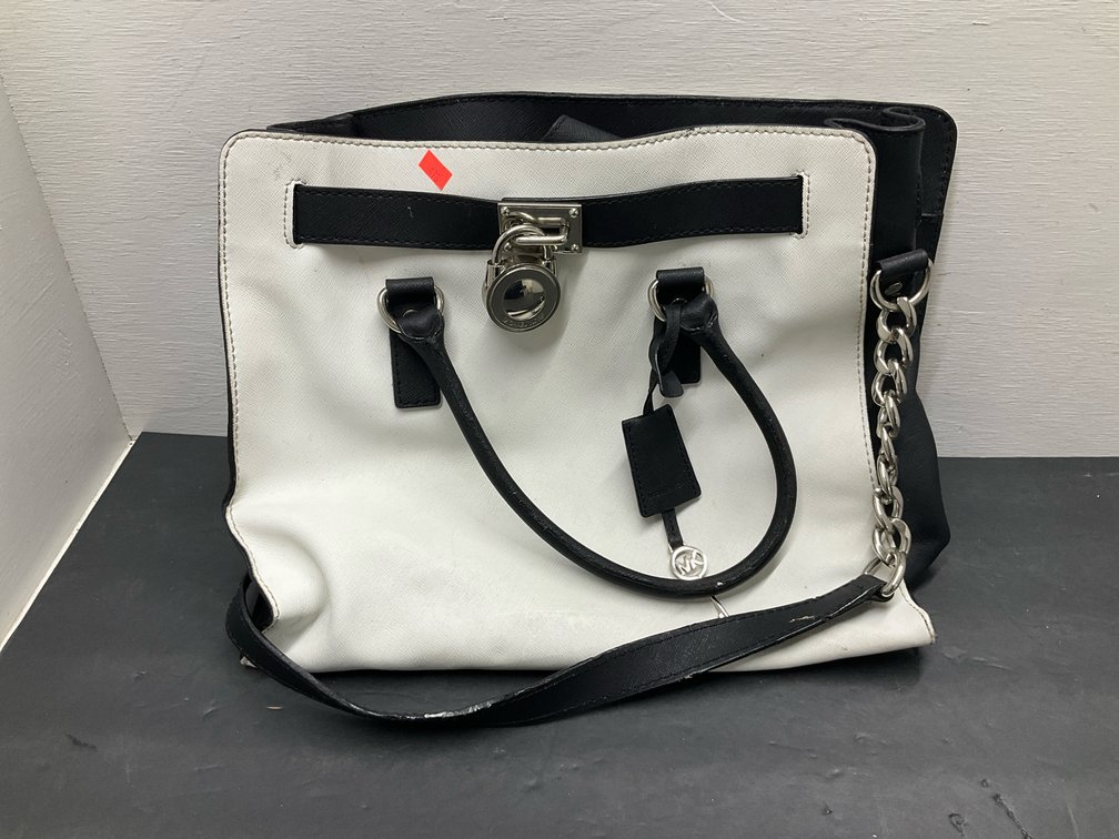 Michael Kors black and white tote handbag with padlock