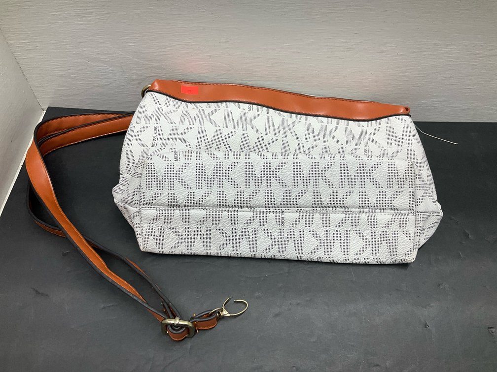 Michael Kors monogram crossbody bag with brown trim