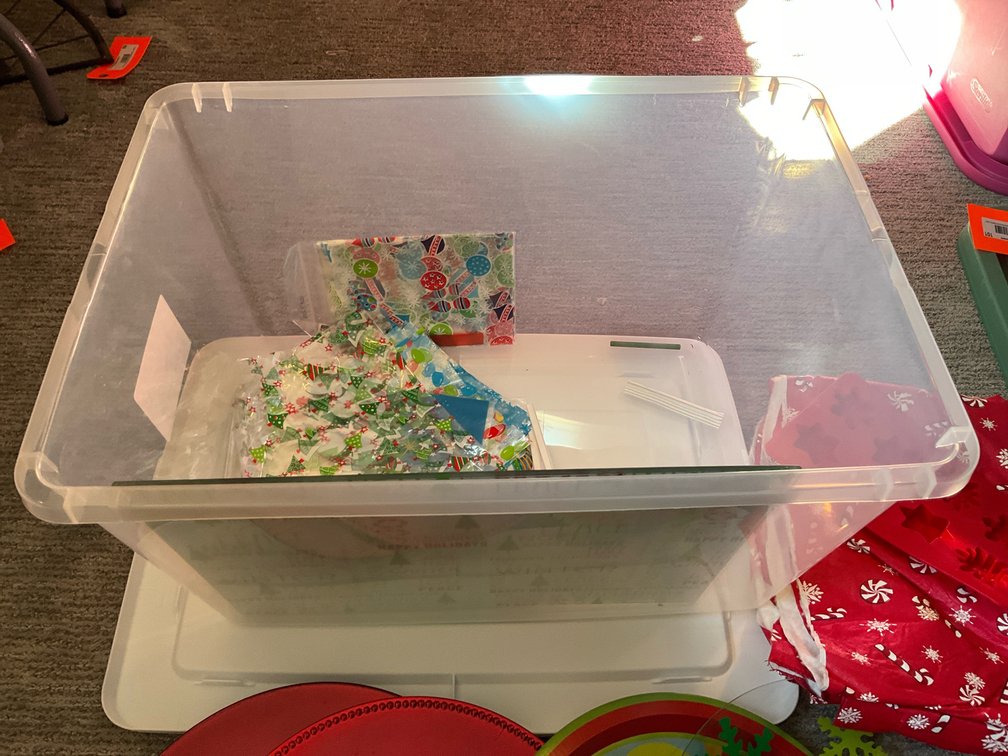 Holiday tableware, decorative tins & plastic storage tote - Basement Living & Bar Area