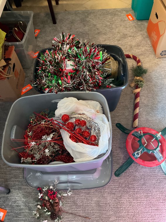 Assorted Christmas decor with metal tree stand & totes - Basement Living & Bar Area