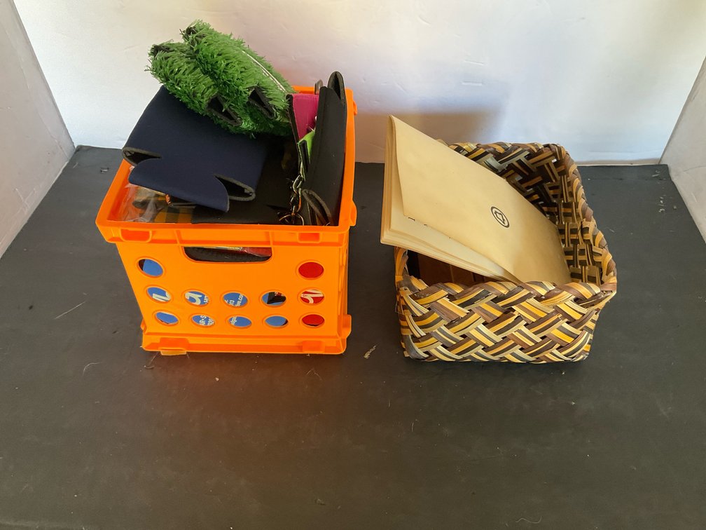 Orange crate with can coolers & woven basket - Garage