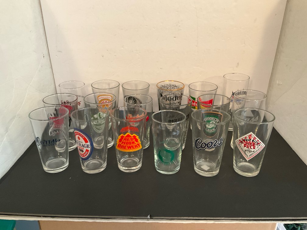 Grouping of brewery & beer logo pint glasses - Basement Living & Bar Area