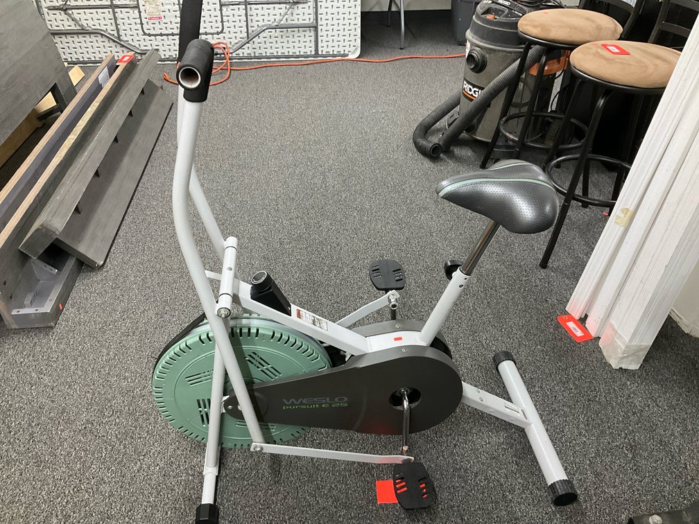 Weslo upright exercise bike with fan flywheel