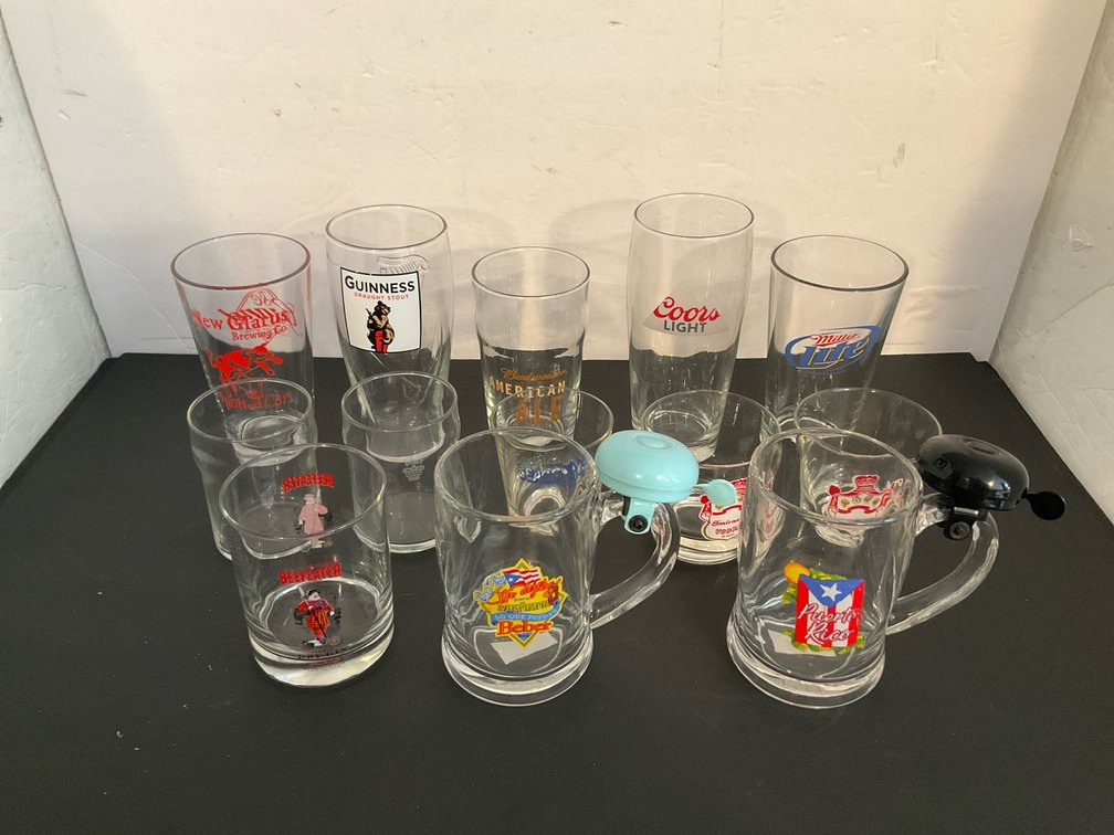 Assorted beer & bar glasses with novelty bell mugs - Basement Living & Bar Area