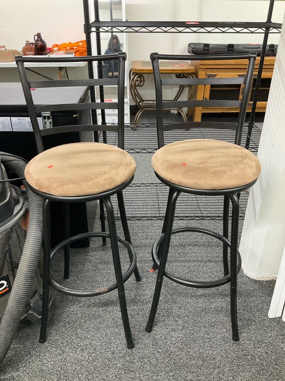 Pair of metal ladder-back swivel barstools 28”
