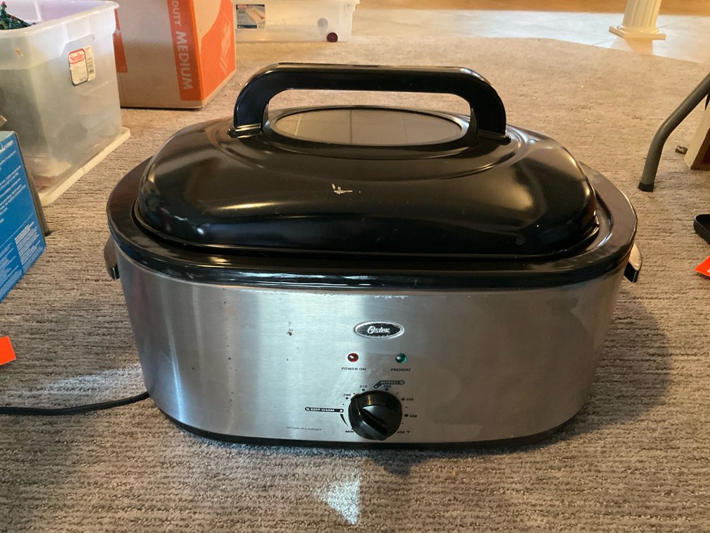 Oster stainless steel electric roaster oven - Basement Living & Bar Area