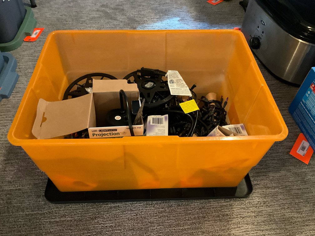 Halloween hanging props, projector & lights with tote - Basement Living & Bar Area