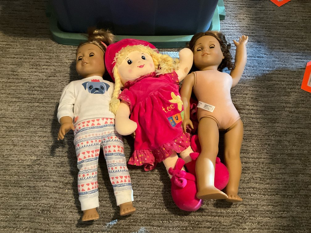 3 dolls with assorted clothing & accessories - Basement Living & Bar Area