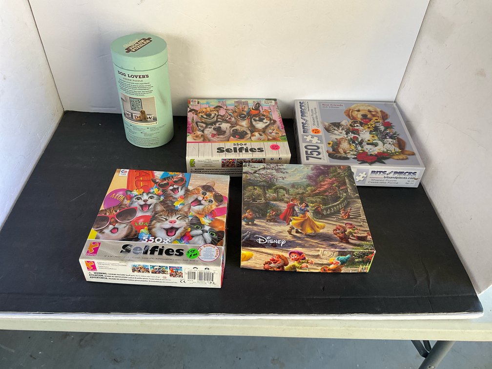 Grouping of 5 assorted animal & Disney jigsaw puzzles - Garage