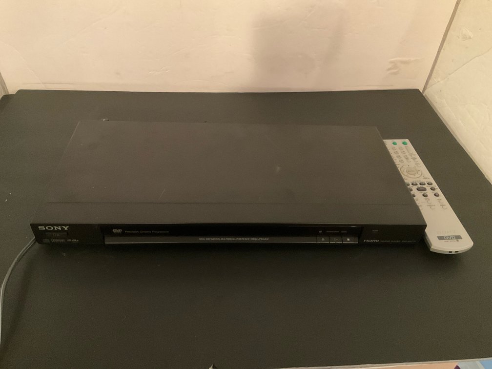 Sony CD/DVD player with remote control - Basement Living & Bar Area