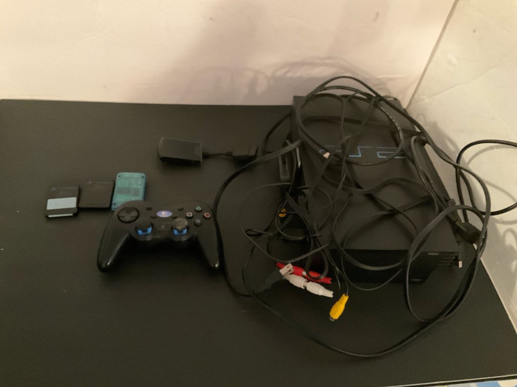 PlayStation 2 console with controller & memory cards - Basement Living & Bar Area