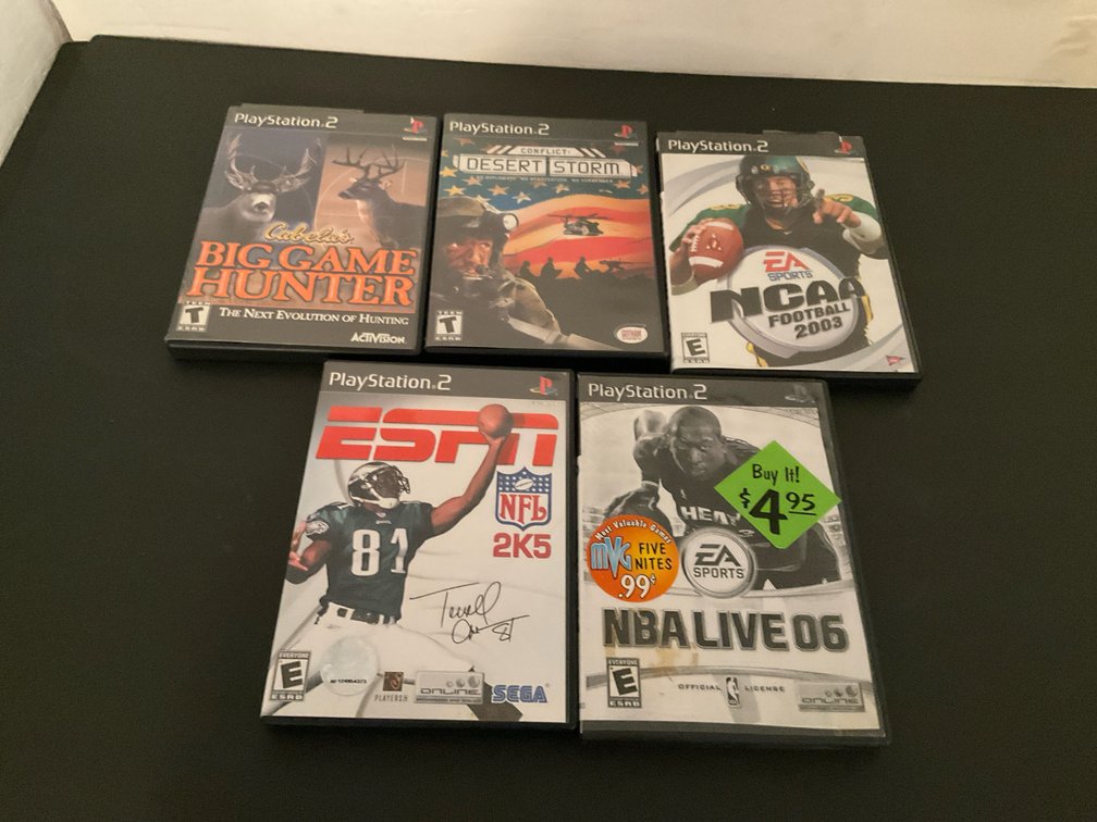 Grouping of PlayStation video games - Basement Living & Bar Area