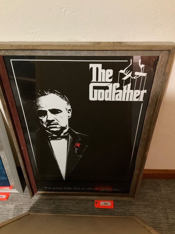 Framed The Godfather print in rustic wood frame - Basement Living & Bar Area