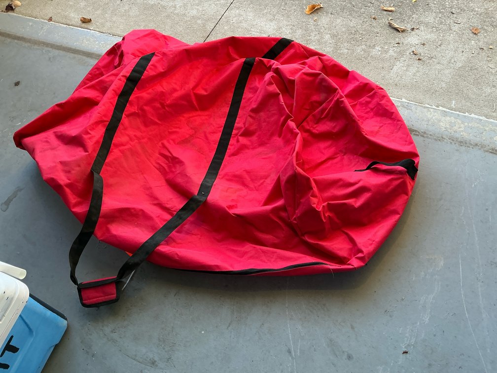 Red circular fabric zippered storage bag - Garage