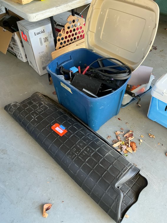 Vehicle cargo liner mat & tote of equipment parts - Garage