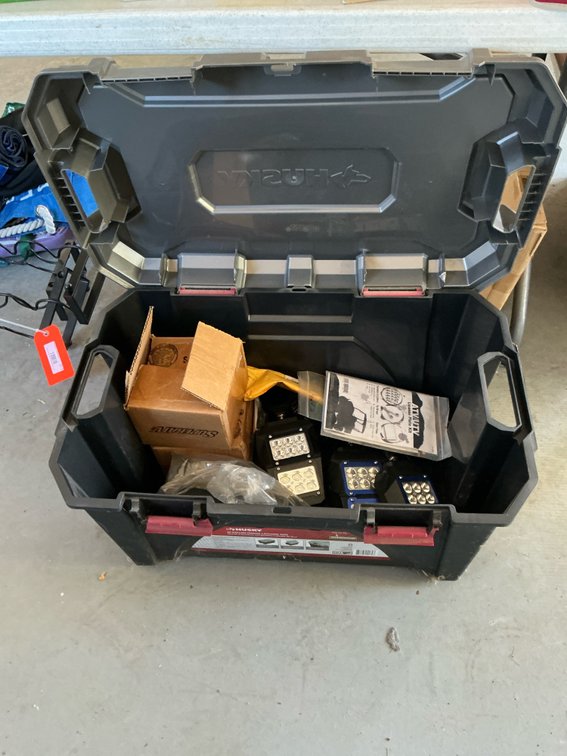 20 gallon storage tote with ATV accessories & lights - Garage