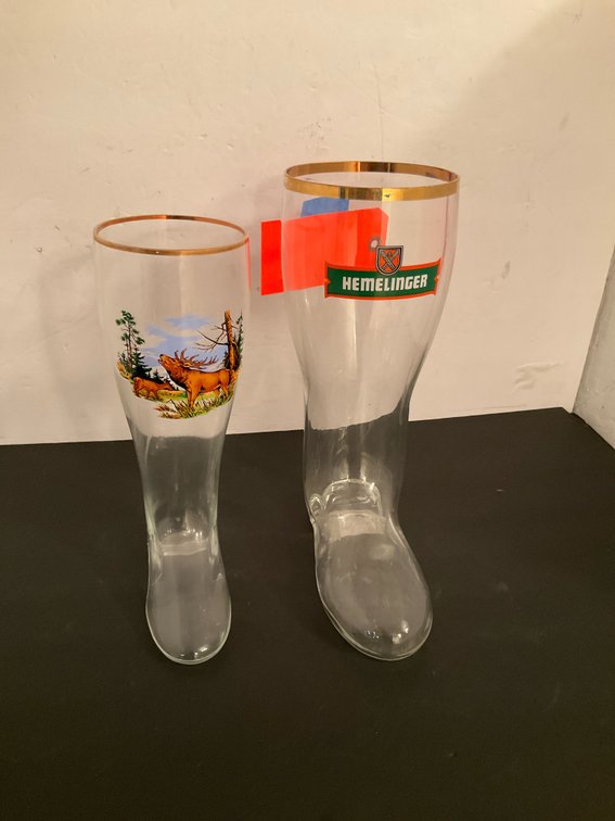 Pair of glass beer boots with gold rims - Basement Living & Bar Area