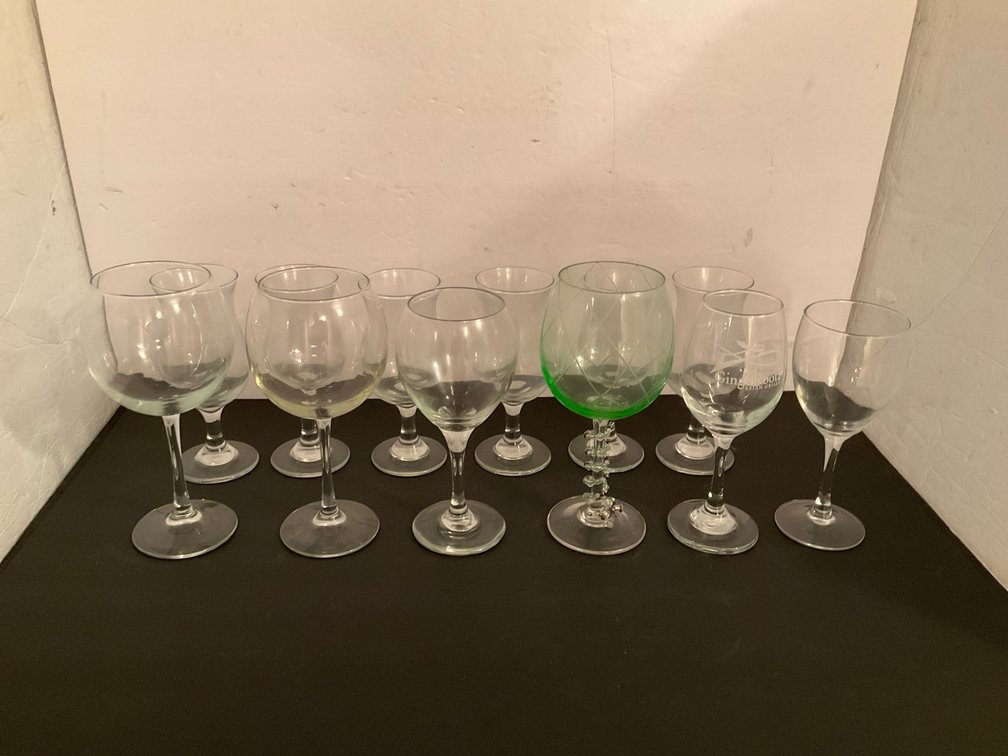 Grouping of stemmed glassware & hurricane glasses - Basement Living & Bar Area