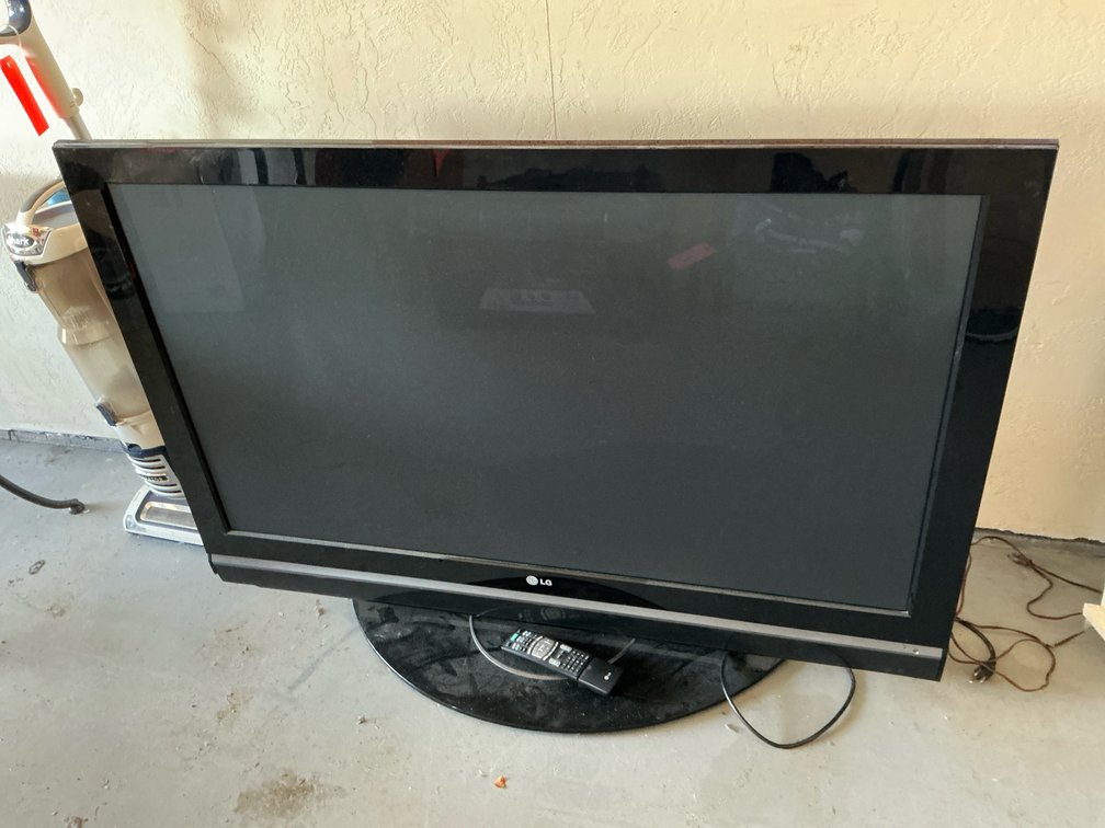 LG plasma 50” television with remote control - Garage
