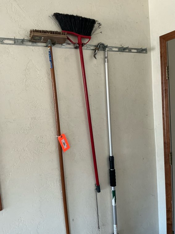 2 brooms & aluminum telescoping extension wand - Garage