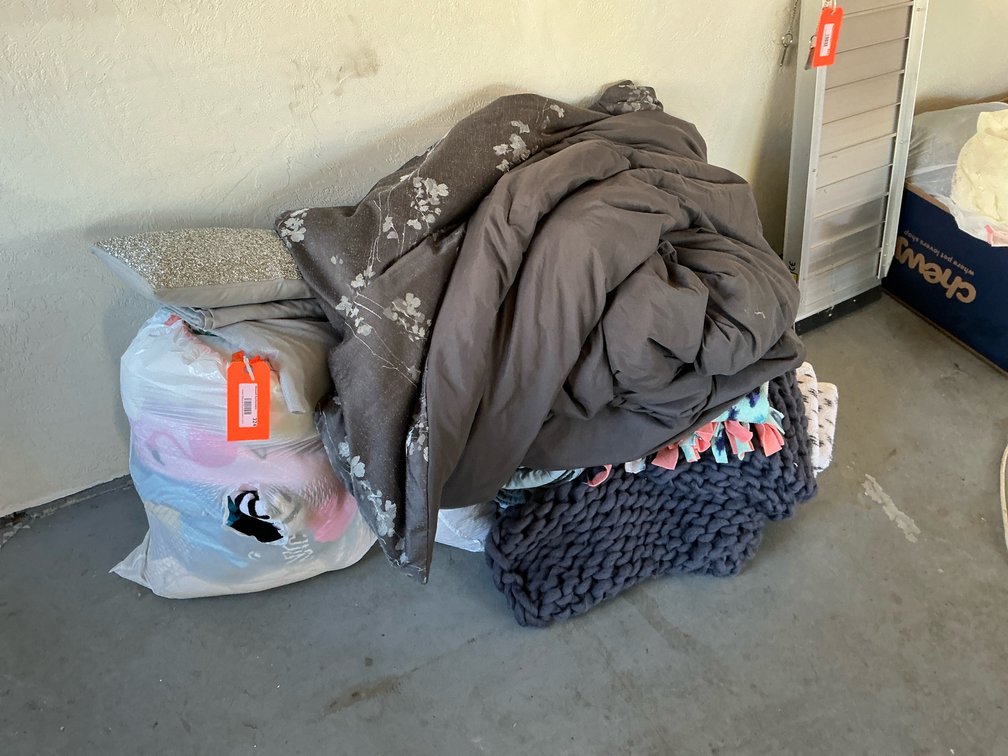 Assorted blankets, comforters & accent pillow - Garage