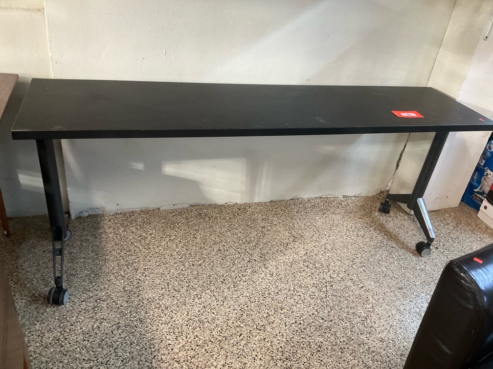 Black rectangular mobile adjustable height training table 72” x 18”