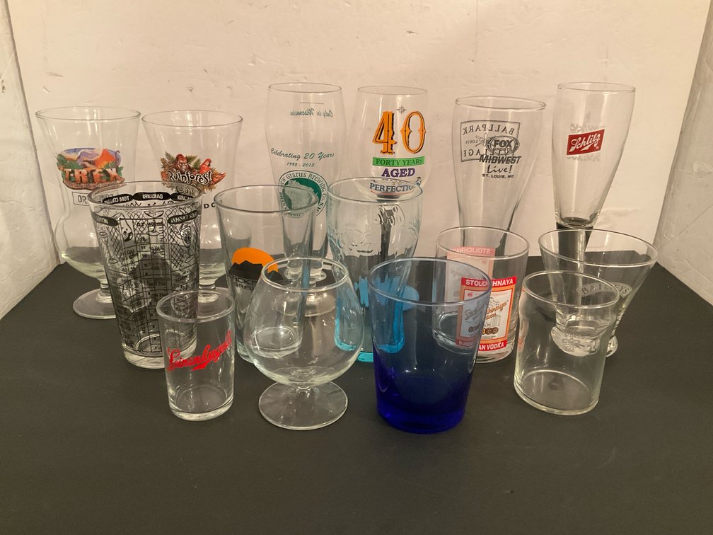 Grouping of branded & novelty drinking glasses - Basement Living & Bar Area