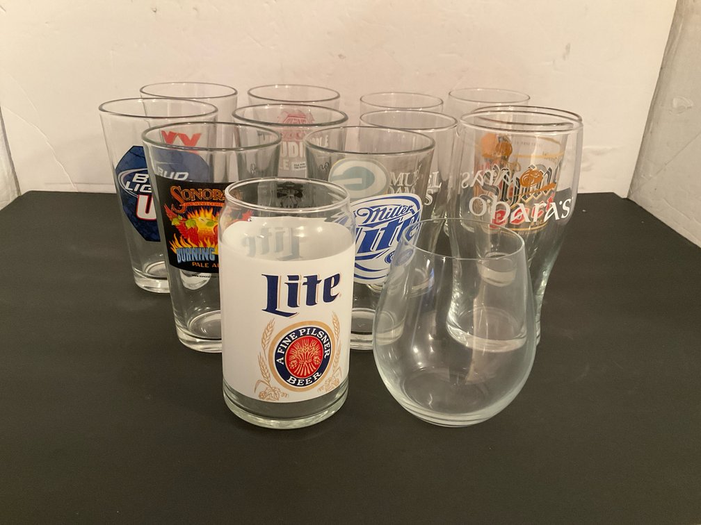 Grouping of assorted beer & brewery glassware - Basement Living & Bar Area