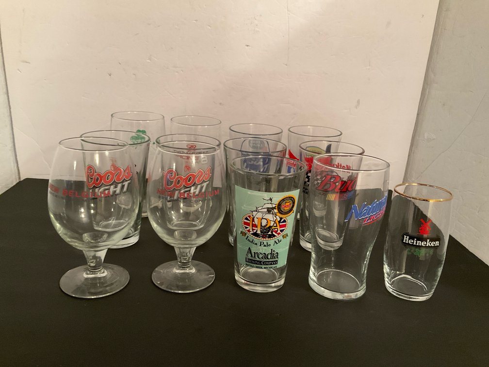 Grouping of assorted brewery and beer glasses - Basement Living & Bar Area