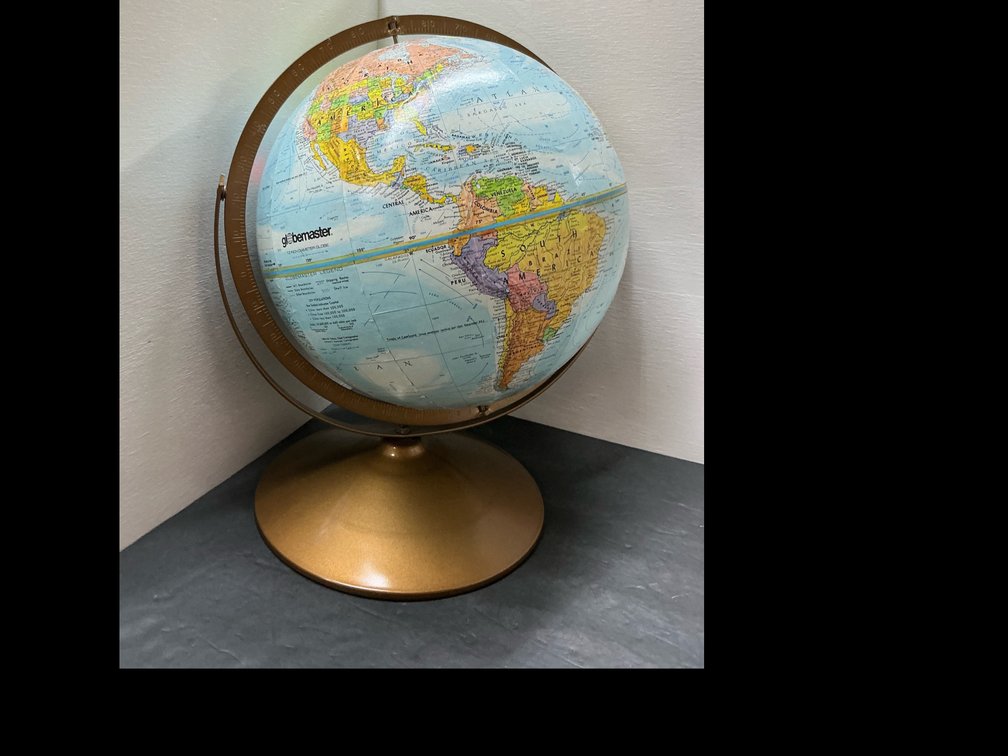 Globemaster 12 in world globe on metal stand