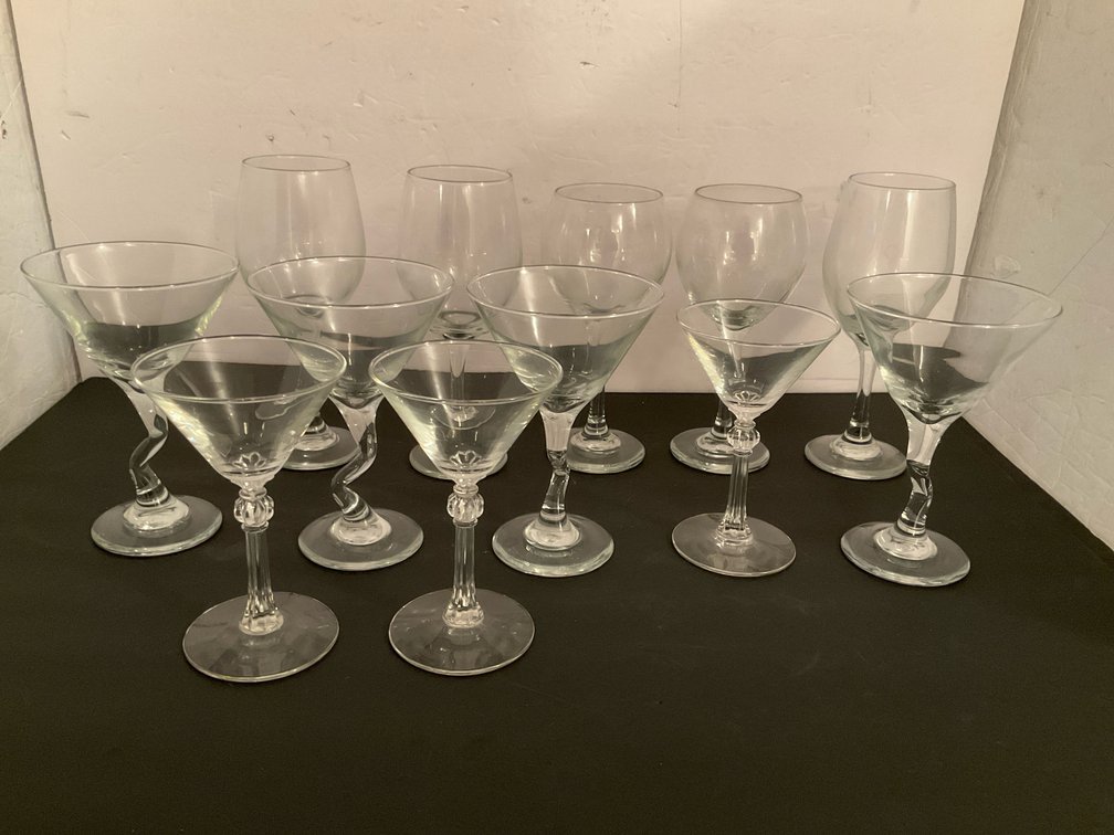 Grouping of clear glass martini & wine glasses - Basement Living & Bar Area