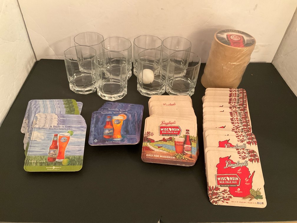 8 faceted glass tumblers & assorted beer coasters - Basement Living & Bar Area
